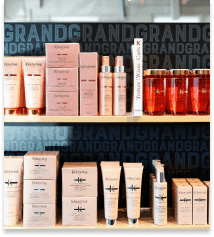 Close-up of Grand Salon branded countertop with retail products