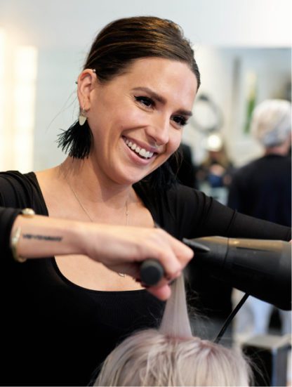 Hair stylist at Grand Salon in Denver