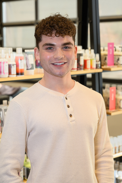 Hair stylist at Grand Salon in Denver